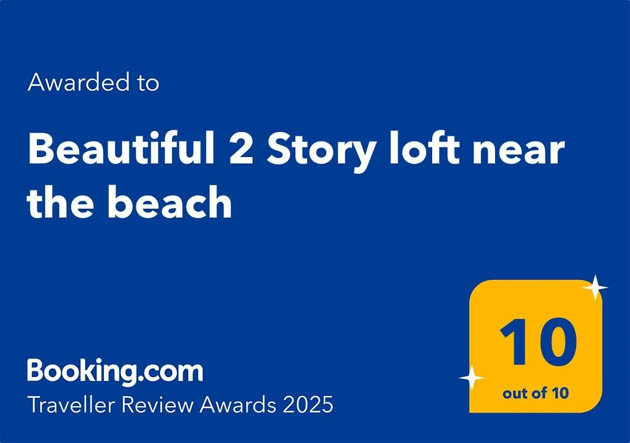 Beautiful 2 Story Loft Near The Beach location